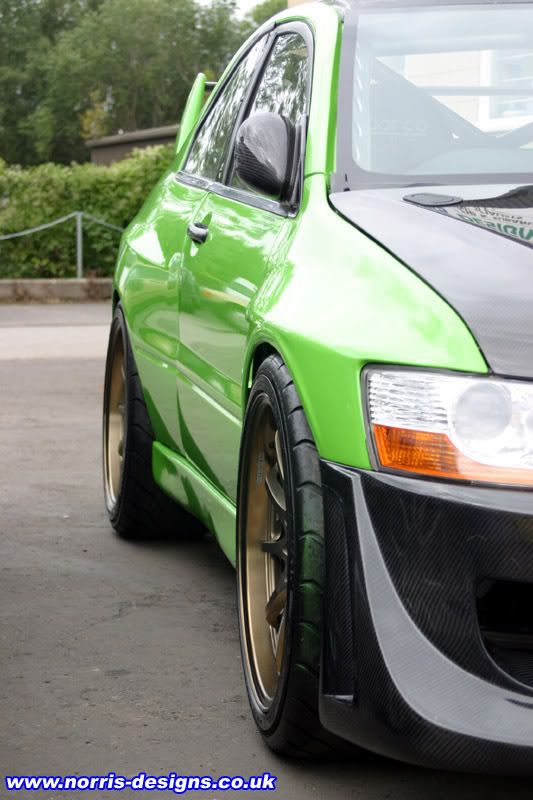 http://i334.photobucket.com/albums/m429/VOTBLINDUB/Random%20Car%20Photos/evo9-front-side.jpg