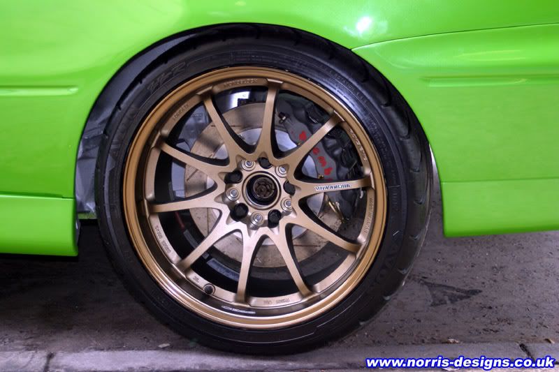 http://i334.photobucket.com/albums/m429/VOTBLINDUB/Random%20Car%20Photos/evo9-wheel-brake.jpg